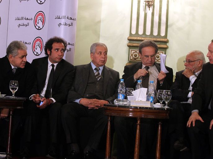 epa03516910 (L to R) Opposition members of National Salvation Fraont Hamdeen Sabahi, Amr Hamzawy, Abdel Gelil Mostafa, Osama Ghazaly Harb, George Ishak, Hussen Abdel Ghaney, hold a joint the press conference, in Cairo, Egypt, 23 December 2012. Egypt's main opposition alliance on 23 December said it will appeal the outcome of the referendum on a draft constitution, which it alleged was marred by fraud and irregularities.The National Salvation Front also said it would run in parliamentary elections expected to be held two months after the new constitution is officially approved.'We are ready to go through all battles of democracy,' said Sabahi, one of the alliance's leaders.'Our participation in the elections will be a key test for us, and we will not allow fraud to be repeated in the upcoming parliamentary elections'. EPA/KHALED ELFIQI