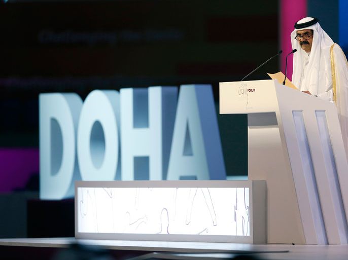 Qatar's Emir Sheikh Hamad bin Khalifa al-Thani speaks at the official opening ceremony of the Doha GOALS forum in Doha December 11, 2012. REUTERS/Fadi Al-Assaad (QATAR - Tags: SPORT POLITICS)
