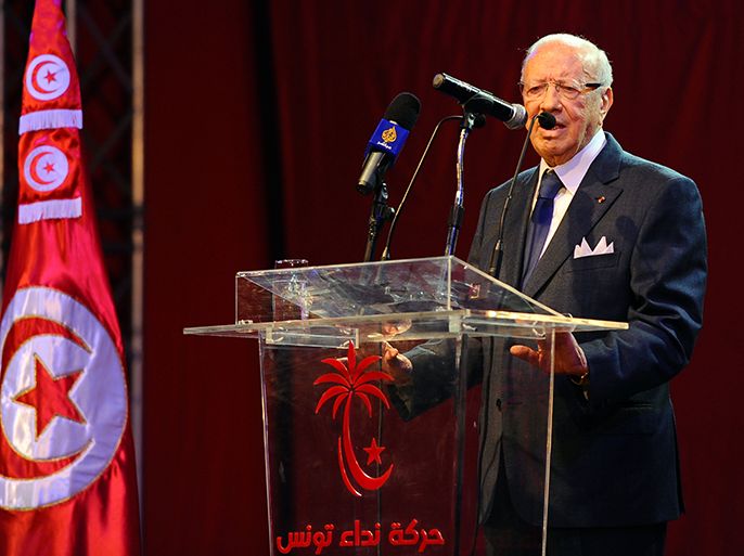 Tunisian former prime minister and opposition leader, Beji Caid Essebsi gives a speech during an open day to mark the first anniversary of his party "Nidaa Tounes" on January 27, 2013, at the Congress Hall of Tunis. Essebsi, has shown its support with the call of the prime minister Hamadi Jebali for a national dialogue and pointed out in his speech that the current government has failed on all fronts and that the change should be radical without stopping simply a cabinet reshuffle. AFP PHOTO / FETHI BELAID