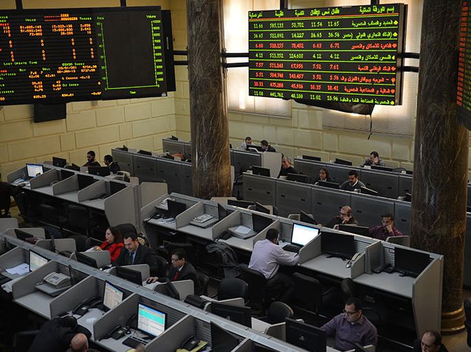 Stock market brokers work at the Egyptian Stock Market in the capital Cairo on January 6, 2013. A top International Monetary Fund official will visit Egypt on January 7, for talks likely to focus on the $4.8 billion loan agreement frozen last month because of political unrest in the country. AFP PHOTO / KHALED DESOUKI