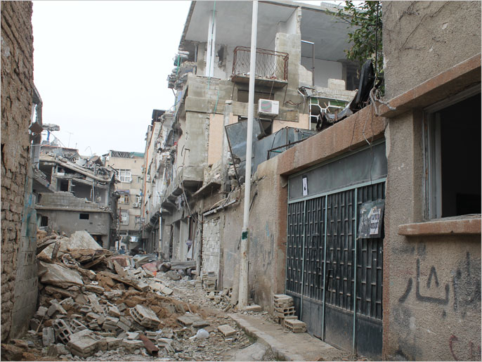 ‪جانب من الدمار الذي لحق بالمدارس الحكومية في ريف دمشق‬ (الجزيرة)