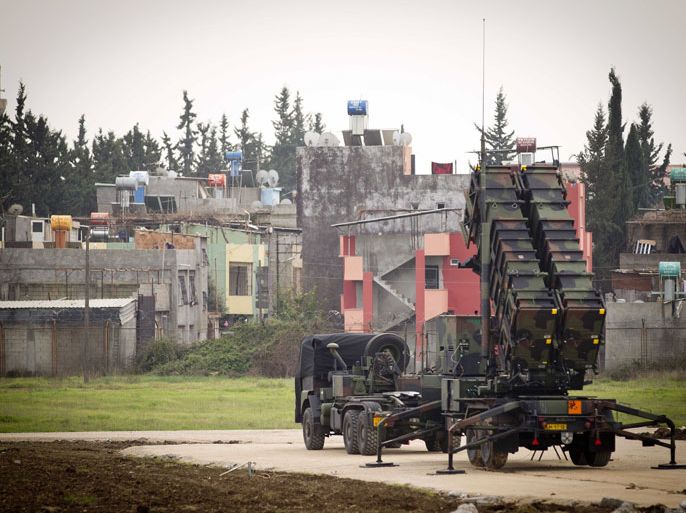 epa03557161 A Dutch Army 'Patriot' defense missile system is set up at an airbase in Adana, Turkey, 26 January 2013. The missiles are ready to be used to protect the country's border against possible attacks from neighboring Syria. EPA/EVERT-JAN DANIELS