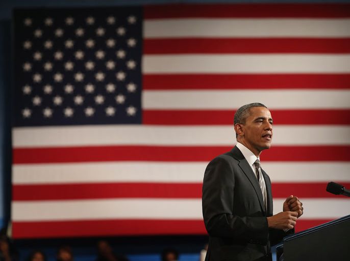 Chicago, Illinois, UNITED STATES : CHICAGO, IL - FEBRUARY 15: President Barack Obama speaks to students and guests during a visit to Hyde Park Academy High School on February 15, 2013 in Chicago, Illinois. This would be the final stop of a three-state tour to promote the agenda from his State of the Union Address. Scott Olson/Getty Images/AFP== FOR NEWSPAPERS, INTERNET, TELCOS & TELEVISION USE ONLY ==