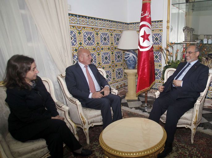 Tunisian Prime Minister Hamadi Jebali (R) talks with the leader of the Progressist democratic party's (PDP) Nejib Chebbi (C) and general secretary Maya Jeridi during a meeting, part of Jebali's quest to form a government of technocrats and steer the country out of crisis, on February 14, 2013 in Tunis. Jebali has been seeking political support for his plan, after the assassination last week of a leftist opposition figure threw Tunisia into turmoil, as he has been facing stiff resistance from ruling party Ennahda.