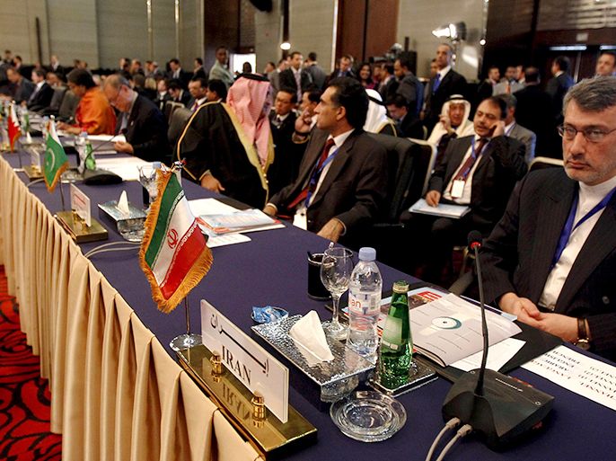 Delegates from Iran attend a foreign ministers meeting ahead of the Organisation of Islamic Cooperation (OIC) summit in Cairo February 4, 2013. The OIC summit will be held from Feb.6-7. REUTERS/Mohamed Abd El Ghany (EGYPT - Tags: POLITICS)