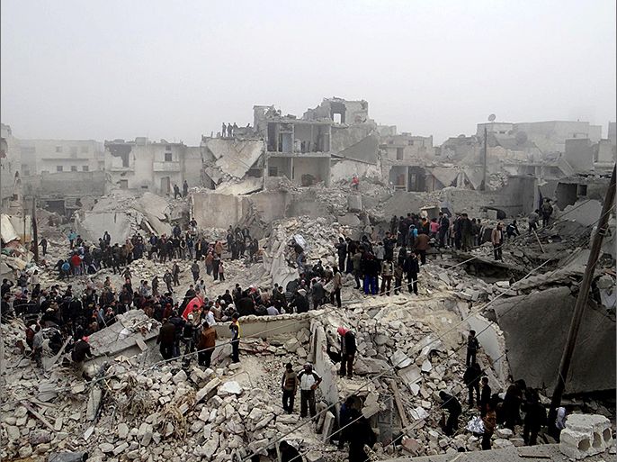 TOPSHOTS A handout picture released by Syria's opposition-run Aleppo Media Centre (AMC) shows Syrians inspecting destruction following an apparent surface-to-surface missile strike on the northern Syrian city of Aleppo on February 19, 2013. Six children were among at least 19 people killed in an apparent surface-to-surface missile strike on the northern Syrian city of Aleppo late on February 18, the Syrian Observatory for Human Rights said. AFP PHOTO/HO/SHAAM NEWS NETWORK