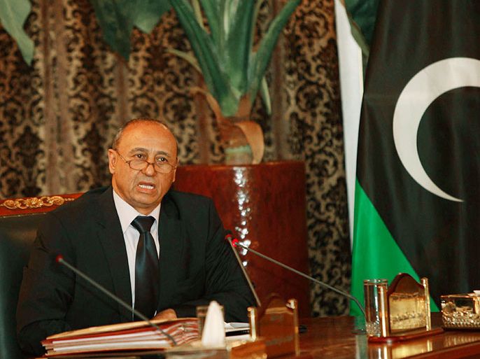 Libya's Foreign Minister Mohammed Abdulaziz speaks during a joint news conference at the headquarters of the Prime Minister's Office in Tripoli March 31, 2013. REUTERS/Ismail Zitouny (LIBYA - Tags: POLITICS CIVIL UNREST)