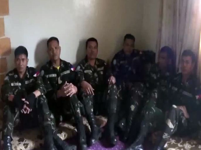 An image grab taken from a video uploaded on YouTube on March 7, 2013, allegedly shows six uniformed members of the United Nations Disengagement Force (UNDOF), who have been seized by rebeles the previous day, speaking at an undisclosed location. Syrian rebels held hostage 21 UN peacekeepers patrolling the sensitive armistice line with Israel for a second day, defying a chorus of international condemnation and calls for their release. AFP PHOTO/YOUTUBE