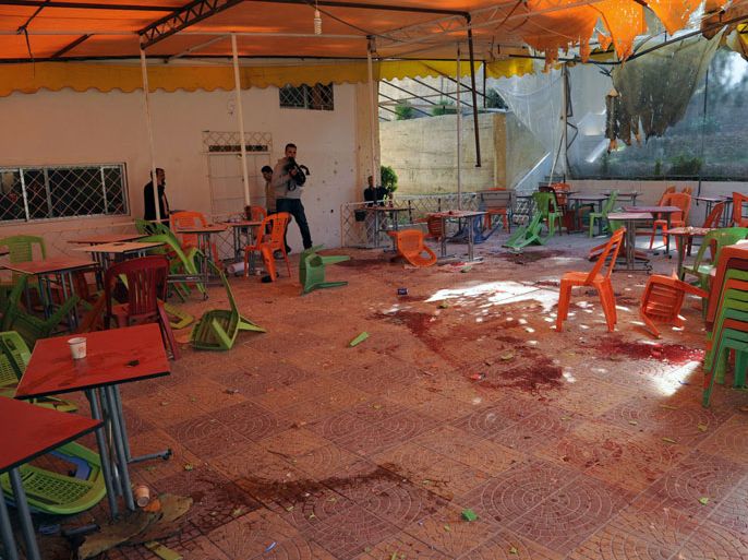 A handout picture released by the Syrian Arab News Agency (SANA) shows blood on tables and on the floor in the cafeteria of the architecture faculty of Damascus University afer it was hit by a mortar attack on March 28, 2013 in Syria. Shelling killed at least 15 students, with state media blaming "terrorists" -- its term for Syrian rebels increasingly targeting President Bashar al-Assad's seat of power. AFP PHOTO/HO/SANA == RESTRICTED TO EDITORIAL USE - MANDATORY CREDIT "AFP PHOTO / HO / SANA" - NO MARKETING NO ADVERTISING CAMPAIGNS - DISTRIBUTED AS A SERVICE TO CLIENTS