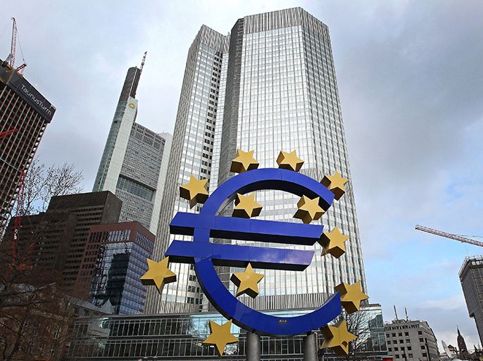(FILES ) The Euro logo is seen in front of the European Central Bank (ECB) in Frankfurt am Main, western Germany, on February 7, 2013. The European Central Bank announced Monday that it would continue providing emergency funding to Cypriot banks after the island nation clinched an eleventh-hour bailout deal with EU-IMF creditors. AFP PHOTO / DANIEL ROLAND