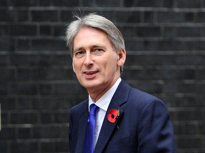 epa03454530 British Defence Minister Philip Hammond arrives to N10 Downing Street in London, Britain, 01 November 2012. Hammond reportedly said European nations needed to cooperate more and work together to tackle security issues in and around their region. EPA/FACUNDO ARRIZABALAGA