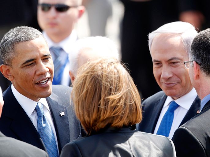 U.S. President Barack Obama (L) stands next to Israel's Prime Minister Benjamin Netanyahu (2nd R) as he speaks with Israeli ministers after landing at Ben Gurion International Airport near Tel Aviv March 20, 2013. Obama arrived in Israel on Wednesday without any new peace initiative to offer disillusioned Palestinians and facing deep Israeli doubts over his pledge to prevent a nuclear-armed Iran. REUTERS/Darren Whiteside (ISRAEL - Tags: POLITICS)