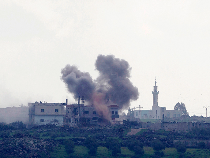 قرية جملا السورية القريبية من الجولان المحتل شهدت اشتباكات كثيفة بين الجيشين الحر والنظامي (رويترز)