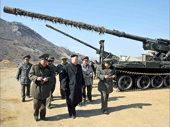 epa03619849 A picture released by the North Korean Central News Agency on 12 March 2013 shows North Korean leader Kim Jong Un inspecting a long-range artillery piece during an inspection of a unit of the Korean People's Army (KPA) in Pyongyang, North Korea, 11 March 2013. North Korea's official media earlier on 11 March had reported that Pyongyang considers the 1953 armistice no longer valid, which it said was in response to joint exercises by the US and South Korean militaries. EPA/KCNA