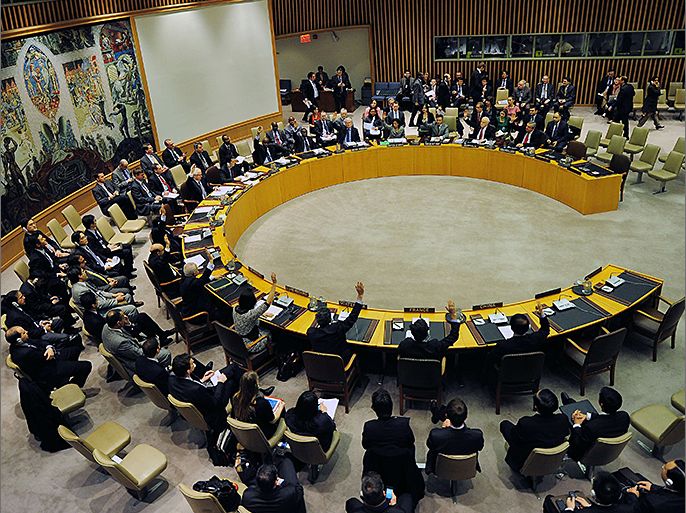 UN Security Council members vote to adopt sanctions against North Korea at the United Nations headquarters in New York, March 7, 2013. North Korea threatened a "pre-emptive" nuclear strike against the United States and any other aggressors as the UN Security Council prepared to adopt tough sanctions against the isolated state. AFP PHOTO/EMMANUEL DUNAND