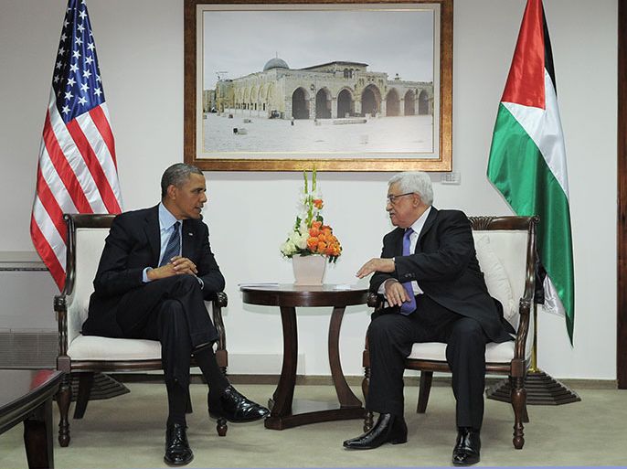 US President Barack Obama (L) and Palestinian president Mahmud Abbas (R) meet during an official arrival ceremony at the Muqata, the Palestinian Authority headquarters in the West Bank city of Ramallah, on March 21, 2013