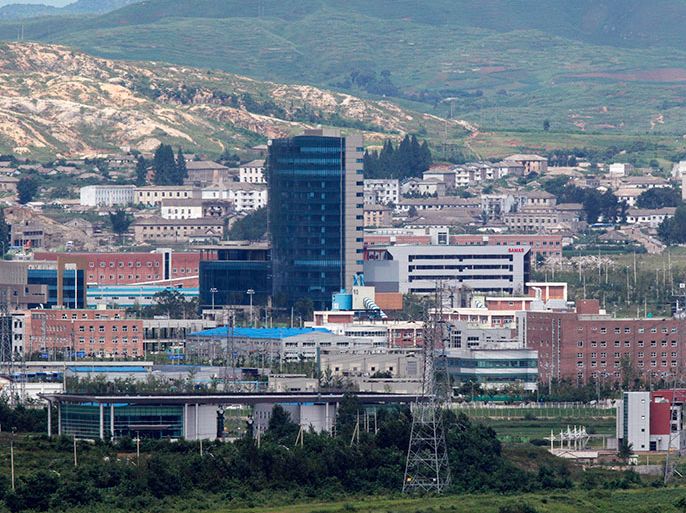 The inter-Korean industrial park in the North Korean border city of Kaesong is seen in this picture taken from the South Korean observation post near the demilitarised zone separating the two Koreas in Paju in this August 11, 2010 file photo. North Korea threatened on March 30, 2013 to shut down the industrial zone it operates jointly with South Korea over perceived insults that the complex is only being kept running to raise money for the impoverished state. "If the puppet traitor group continues to mention the fact Kaesong industrial zone is being kept operating and damages our dignity, it will be mercilessly shut off and shut down," the North's KCNA news agency quoted an agency that operates the factory park just miles north of the rivals' armed border as saying. REUTERS/Jo Yong-Hak/Files (SOUTH KOREA - Tags: MILITARY POLITICS)