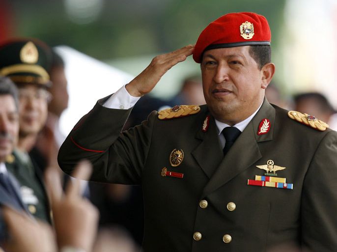 epa03611333 (FILE) A file picture dated 19 April 2010 shows Venezuelan President Hugo Chavez saluting during the Venezuelan independence bicentenary celebrations at the National Pantheon of Caracas, Venezuela. According to a statement by the Venezuelan government on 05 March 2013