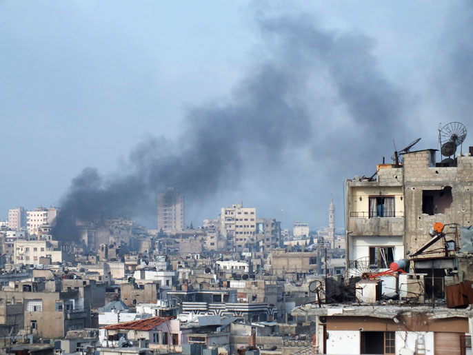 ‪أحياء حمص تعرضت لقصف براجمات الصواريخ والمدفعية الثقيلة‬ (رويترز-أرشيف)