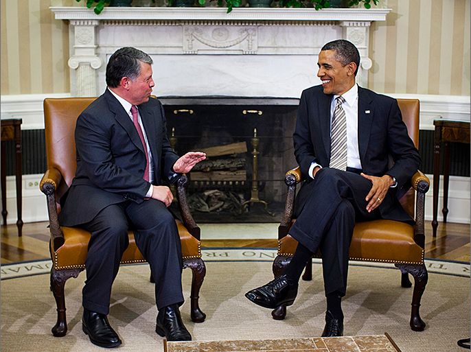 epa03064285 US President Barack Obama (R) meets with King Abdullah II of Jordan (L) in the Oval Office of the White House in Washington, DC, USA 17 January 2012. The White House said they discussed the King's leadership in advancing the goal of a negotiated peace between Israel and the Palestinians. EPA/JIM LO SCALZO