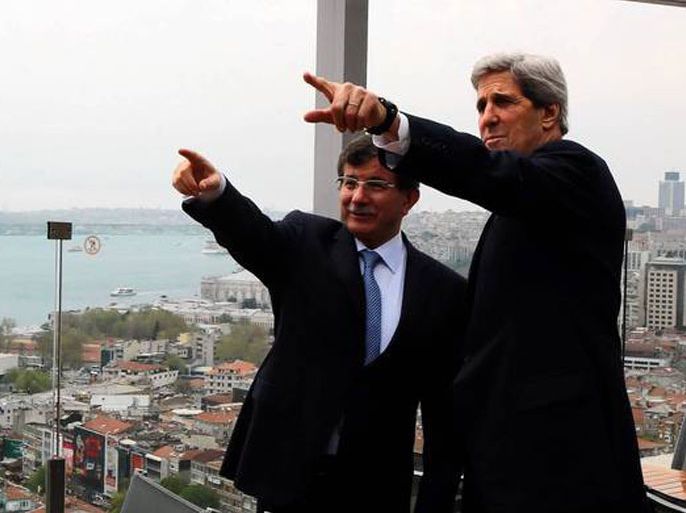 Turkish Foreign Minister Ahmet Davutoglu shows U.S. Secretary of State John F. Kerry the skyline of Istanbul before the start of a meeting in the Turkish city. (Hakan Goktepe / AFP/Getty Images / April 21, 2013