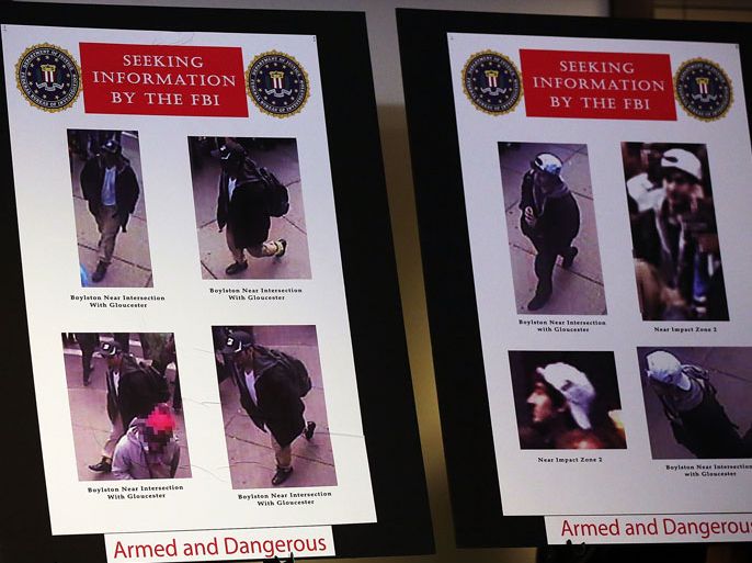 BOSTON, MA - APRIL 18: Images are viewed taken from a security camera of persons of interest in the twin bombings at the Boston Marathon during a news conference on April 18, 2013 in Boston, Massachusetts. Authorities investigating the attack on the Boston Marathon have shifted their focus on locating the person who placed a black bag down and walked away just before the bombs went off. The twin bombings at the 116-year-old Boston race, which occurred near the marathon finish line, resulted in the deaths of three people while hospitalizing at least 128.