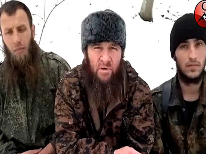 (FILES) This undated screen grab taken from video posted on February 3, 2012, on the Islamist rebel mouthpiece kavkazcenter.com shows a man identified as Chechen Islamist rebels leader Doku Umarov (C) recording his appeal in an undisclosed location. A website prominently used by Russia's North Caucasus rebels on April 21, 2013 denied any link to the Boston Marathon bombings that have been blamed on two ethnic-Chechen suspects. "We are only fighting Russia, which is not only responsible for the occupation of the Caucasus, but also for monstrous crimes against Muslims," the rebel site said. US media repots over the weekend said that the Federal Bureau of Investigations was studying the Tsarnaev brothers' possible links to the Caucasus Emirate movement led by the feared warlord Doku Umarov.