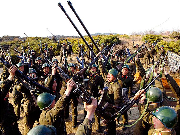 North Korean soldiers attend military drills in this picture released by the North's official KCNA news agency in Pyongyang March 20, 2013. KCNA said this picture was taken on March 20, 2013. REUTERS/KCNA (NORTH KOREA - Tags: POLITICS MILITARY) ATTENTION EDITORS - THIS PICTURE WAS PROVIDED BY A THIRD PARTY. REUTERS IS UNABLE TO INDEPENDENTLY VERIFY THE AUTHENTICITY, CONTENT, LOCATION OR DATE OF THIS IMAGE. THIS PICTURE IS DISTRIBUTED EXACTLY AS RECEIVED BY REUTERS, AS A SERVICE TO CLIENTS. QUALITY FROM SOURCE. NO THIRD PARTY SALES. NOT FOR USE BY REUTERS THIRD PARTY DISTRIBUTORS