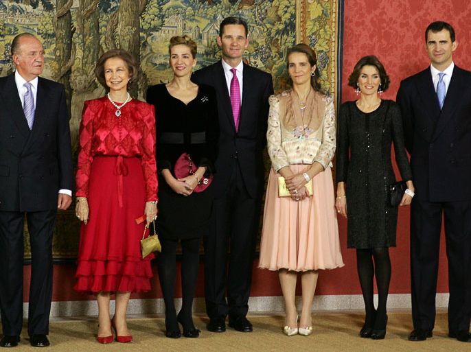 file picture taken on January 9, 2008 shows (from L) Spain's King Juan Carlos, Queen Sofia, Princess Cristina and her husband Inaki Urdangarin, Princess Elena, Princess Letizia and her husband Crown Prince Felipe posing before of a official dinner to celebrate the King's 70th birthday at the Pardo Palace in Madrid. Spain's Princess Cristina has been summoned to testify as a suspect in a corruption case involving her husband, a court official said on April 3, 2013, an historic blow to the prestige of the royal family including her father King Juan Carlos. The princess must testify as a suspect on April 27 at the court in Palma on the Mediterranean island of Mallorca in a case centred on accusations of embezzlement and influence peddling by her husband, Inaki Urdangarin.