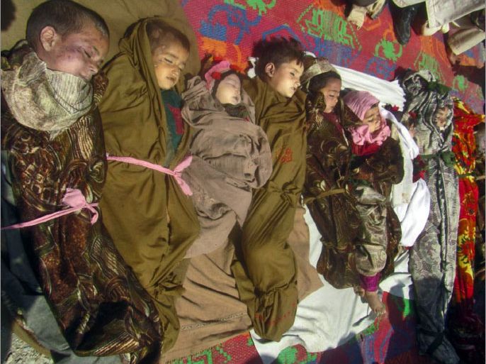 The bodies of nine dead children are pictured in the Shigal district of restive Kunar on April 7, 2013. A NATO air attack in eastern Afghanistan has killed 11 children, officials said Sunday, the latest case of civilian casualties which provoke great anger in the war-torn country. The children were killed during a joint Afghan-NATO operation in the Shigal district of restive Kunar province bordering Pakistan late on Saturday. AFP PHOTO / STR