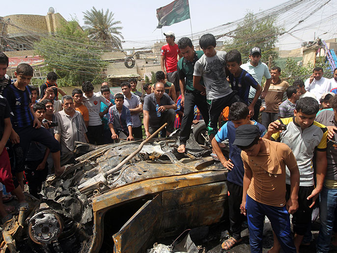 موقع انفجار سيارة مفخخة بمدينة الصدر ببغداد (الفرنسية-أرشيف)