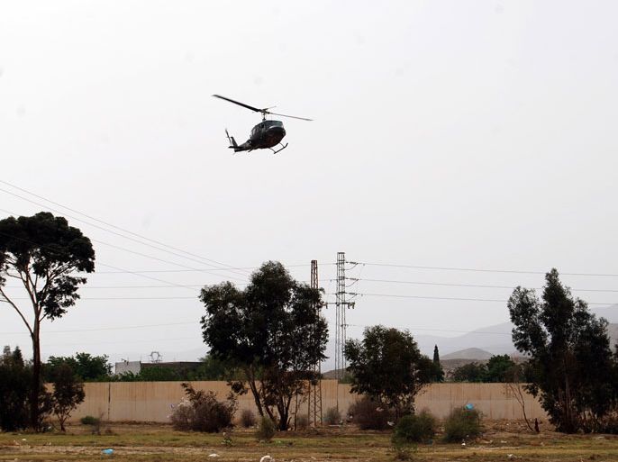 An helicopter of Tunisian army patrols during the search operations for a jihadist group hiding out near the Mount Chaambi, a border region with Algeria on May 3, 2013. Tunisia's army pressed its hunt for jihadists, an operation in which 15 security force members have been wounded, the interior ministry said.
