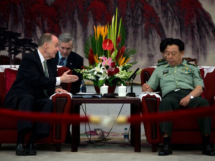XAY103 - Beijing, -, CHINA : US National Security Advisor Tom Donilon (L) speaks with Fan Changlong, vice chairman of China's Central Military Commission, during their meeting at the Bayi Building, headquarters of Chinese Defense Ministry, in Beijing on May 28, 2013. Donilon's visit comes ahead of a meeting between presidents Xi Jinping and Barack Obama in California in early June. AFP PHOTO / POOL / Alexander F. Yuan