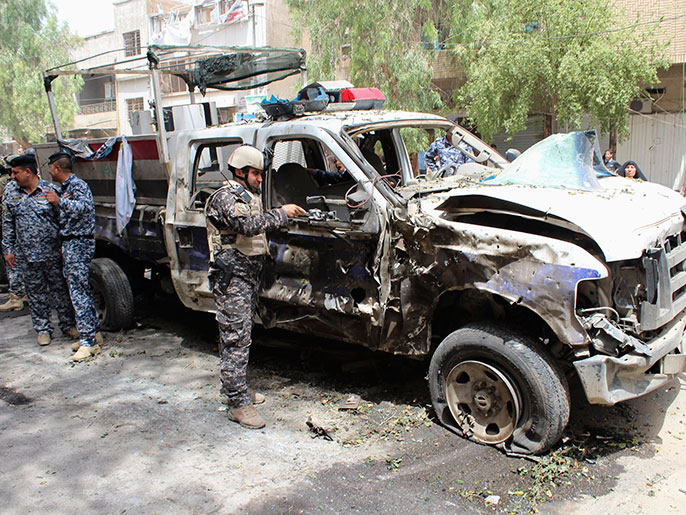 تفجير سابق بأحد أحياء العاصمة العراقية (رويترز)