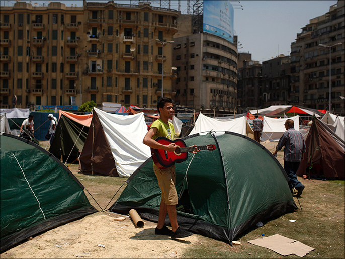 ‪معارضون لمرسي بدؤوا اعتصاما بميدان التحرير‬ (رويترز)
