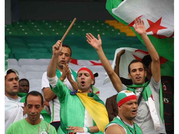 Algeria's supporters cheer their team during the 2014 FIFA World Cup qualifying football match Benin vs Algeria on June 9, 2013 at the Charles de Gaulle stadium in Porto-Novo, Benin. AFP PHOTO / STRINGER