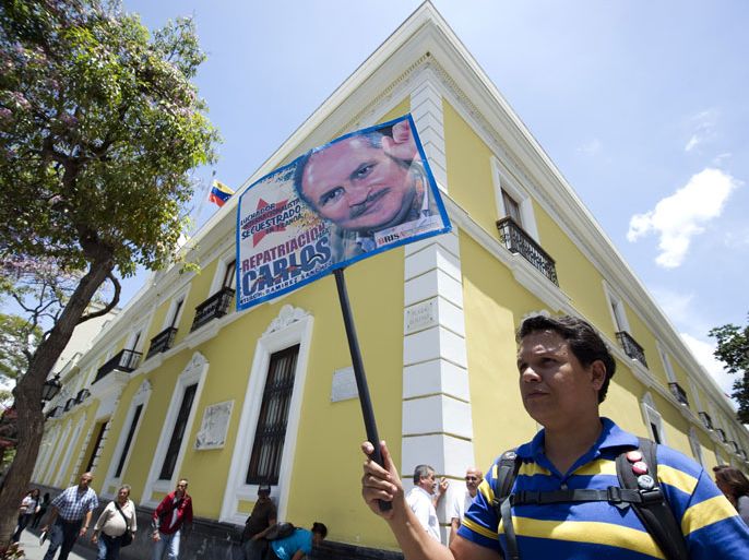 Caracas, -, VENEZUELA : (FILES) - A file picture shows supporters of Venezuelan militant Illich Ramirez Sanchez, better known as Carlos the Jackal, taking part in a demonstration in front of the Ministry of Foreign Affairs in Caracas on May