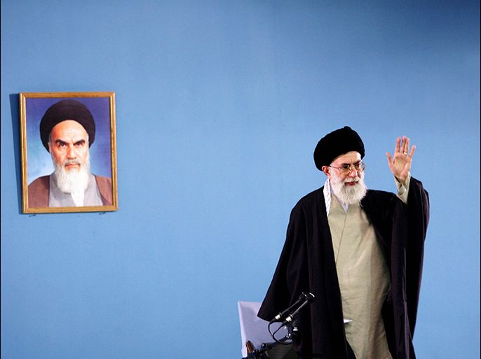 Iran's Supreme Leader Ayatollah Ali Khamenei gestures as he speaks to workers in Tehran in this April 26, 2006 file picture.
