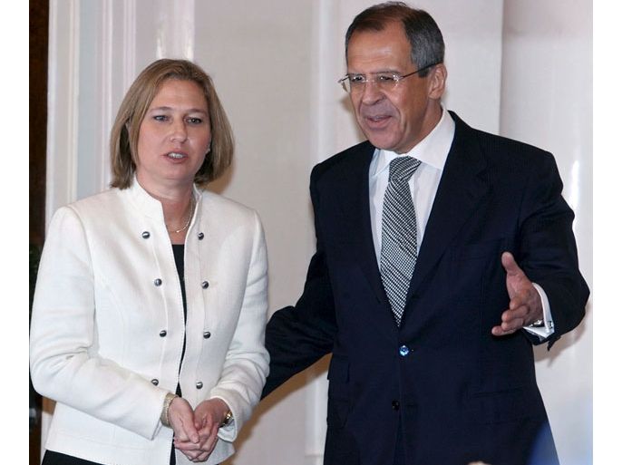 epa01224891 Russian Foreign Minister Sergey Lavrov (R) welcomes Israeli Foreign Minister Tzipi Livni (L) during their meeting in Moscow 17 January 2008. Foreign Minsiters of two countries discussed bilateral relations and Middle East settlement. EPA/SERGEI ILNITSKY