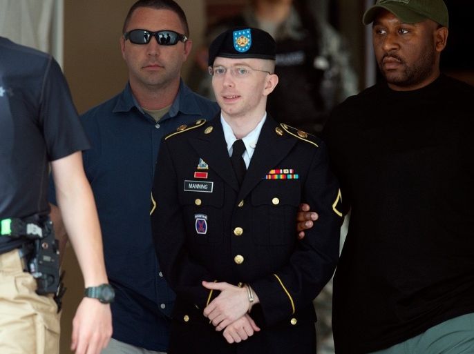 US Army Private First Class Bradley Manning leaves a military court facility after hearing his verdict in the trial at Fort Meade, Maryland on July 30, 2013. A US military judge convicted Manning of espionage, leaving him facing a lengthy jail term despite clearing him on the most serious charge that he 'aided the enemy.' Colonel Denise Lind found Manning guilty of 20 of 22 counts related to his leaking of a huge trove of secret US diplomatic cables and military logs to the WikiLeaks website. She said she would begin sentencing hearings on July 31 at the Fort Meade military base outside Washington where the trial was held. If Lind decides to impose penalties in the higher ranges permitted under the charges, the now 25-year-old Manning could face a de facto life sentence of more than 100 years in jail.