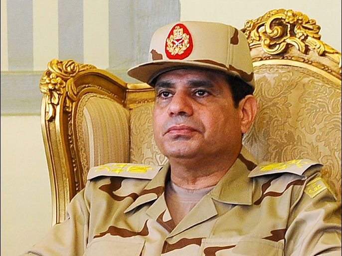 Egypt's Defense Minister Abdel Fattah al-Sisi is seen during a news conference in Cairo on the release of seven members of the Egyptian security forces kidnapped by Islamist militants in Sinai, in this May 22, 2013 file picture. To match Special Report EGYPT-PROTESTS/DOWNFALL REUTERS/Stringer/Files (EGYPT - Tags: MILITARY HEADSHOT POLITICS)