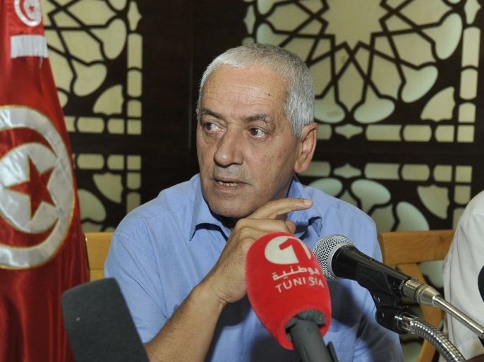 Houcine Abbassi (L), Secretary General of the Tunisian General Labour Union (UGTT), speaks during a meeting of the UGTT's administrative committee on July 29, 2013 in Tunis. The committee met to discuss its response to the asssassination last week of opposition figure Mohamed Brahmi.