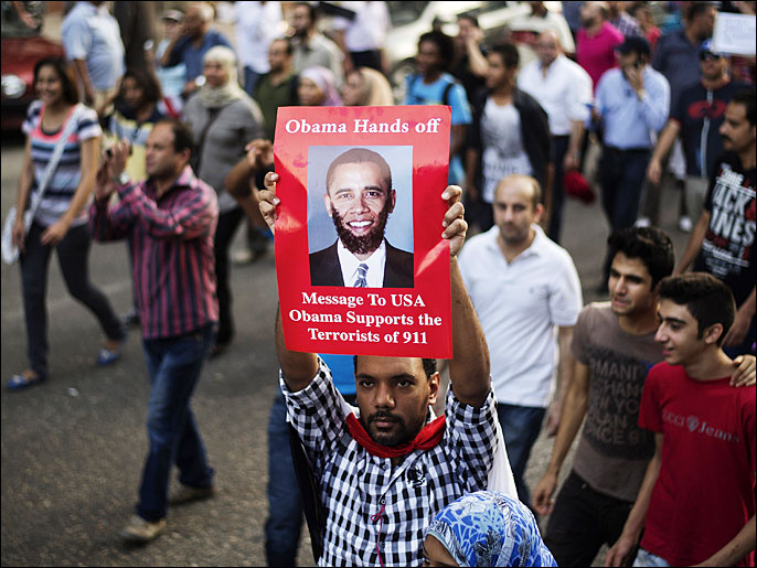 ‪‬  أحد متظاهري ميدان التحرير يتهم واشنطن بدعم الإرهاب (الفرنسية)