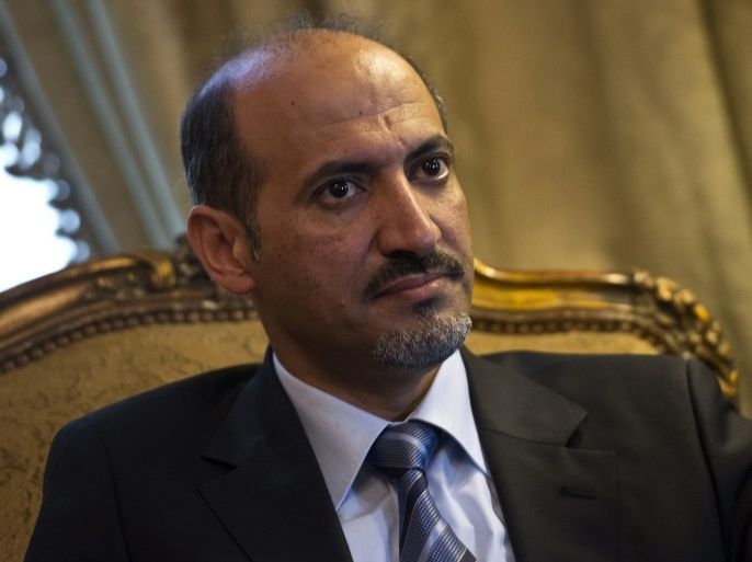 Syrian Coalition President Ahmad Jarba is seen during a meeting with Egyptian Foreign Minister Nabil Fahmy (R) in Cairo on July 21, 2013. Jarba has set his priority on securing arms for rebels fighting regime troops since 2011, in remarks published over the weekend.
