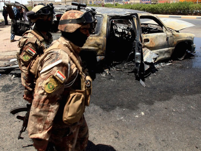 ‪قوة التفجيرات وتزامنها يربك قوات الأمن العراقية‬ (أسوشيتد برس-أرشيف)