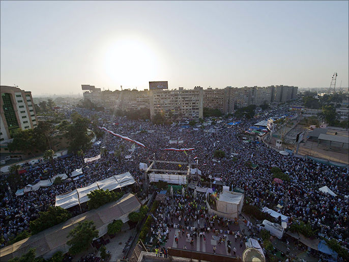 أنصار مرسي لا يزالوان يعتصمون بميدان رابعة العدوية بالقاهرة (الفرنسية)