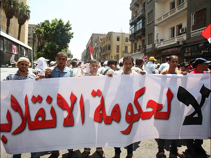 مؤيدو مرسي تظاهروا أمام مقر مجلس الوزراء لرفض حكومة الببلاوي.