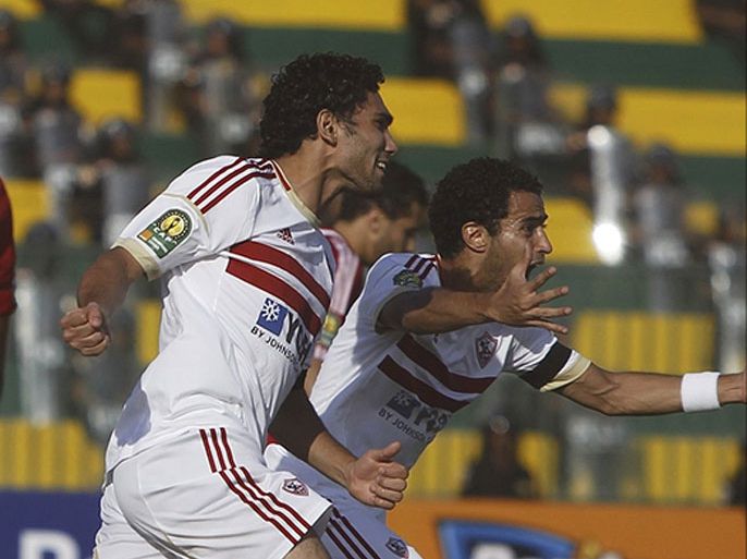 Zamalek players celebrate after scoring a goal against derby rivals Al Ahly during their CAF Champions League soccer match at El-Gouna stadium in Hurghada, about 464 km (288 miles) from the capital Cairo July 24, 2013.