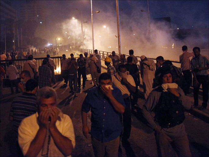 ‪المحتجون من الإخوان المسلمين عقب المجزرة‬ المحتجون من الإخوان المسلمين عقب المجزرة (غيتي-الفرنسية)