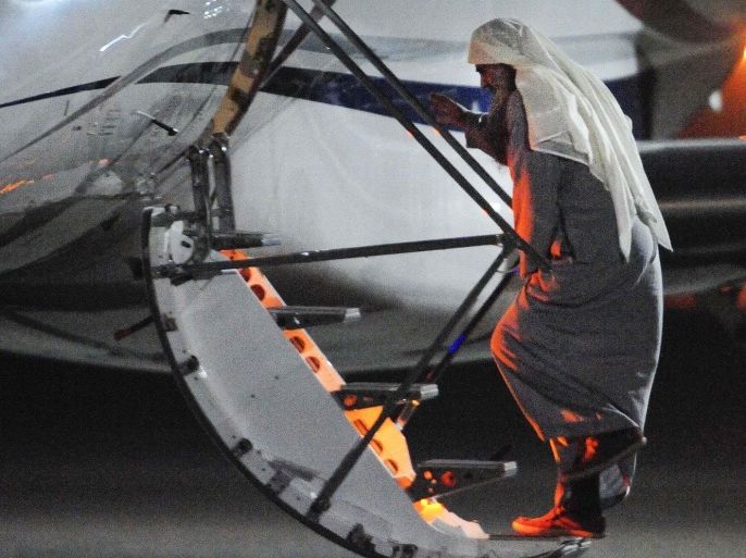 Muslim cleric Abu Qatada boards a small aircraft bound for Jordan during his deportation from Royal Air Force base Northolt in London July 7, 2013 in a picture provided by Britain's Ministry of Defence. Britain deported Qatada to Jordan on Sunday, ending eight years of government efforts to send him home for trial on charges of alleged terrorism.
